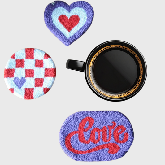 Handmade quilted heart mug rugs in checkered, purple heart, and love oval designs
