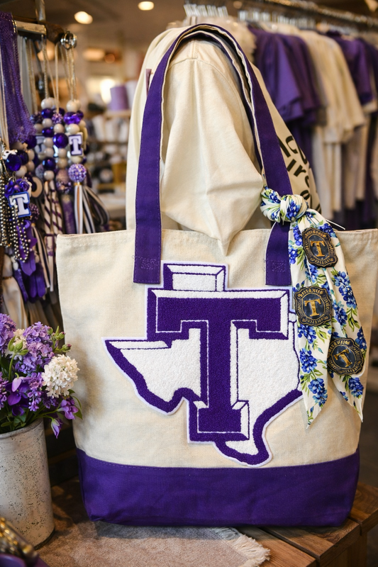 • Licensed Tarleton State University canvas tote bag
• Tarleton Texans chenille T over Texas tote
• Purple and cream Tarleton zip top tote bag
• Large Tarleton game day canvas bag