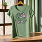 🍀 Doggie Kisses and Shamrock Wishes Shirt | St. Patrick’s Day Dog Mom Tee | Cute Shamrock Paw Print Graphic T-Shirt