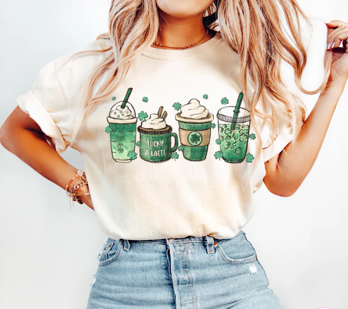 Lucky A Latte St. Patrick’s Day Coffee Shirt | Cute Green Latte Graphic Tee | Trendy Women’s Spring Coffee Lover T-Shirt