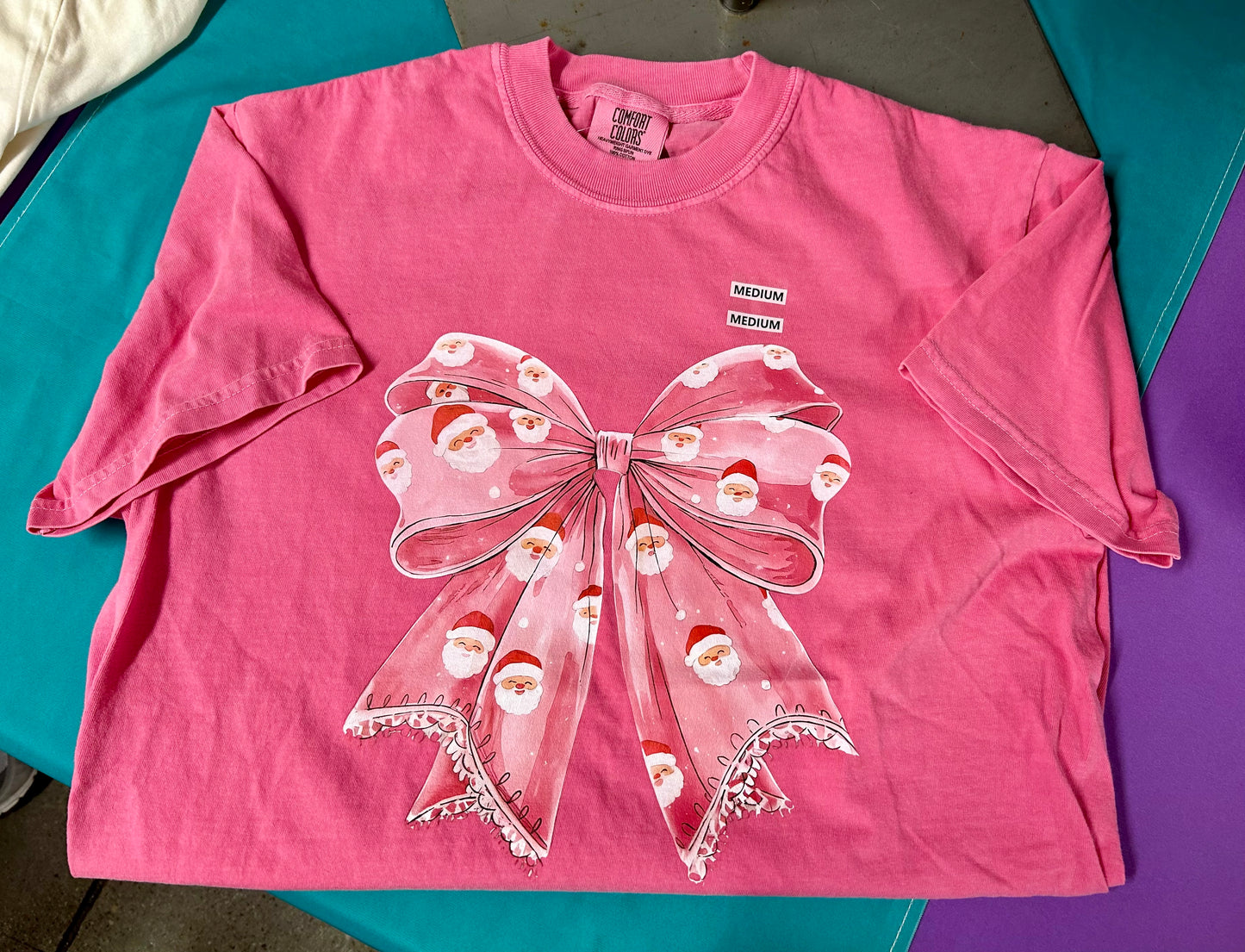 Pink Santa Bow Comfort Colors Tee – Christmas Ribbon Bow Graphic T-Shirt