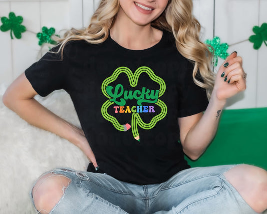 Lucky Teacher Shirt – St. Patrick’s Day Teacher Tee – Shamrock Teacher Shirt – Cute March School Shirt – Black or Neon Purple