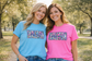 Tarleton Mom shirt in turquoise and pink worn by two moms representing Tarleton State University spirit wear
