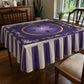 Tarleton mahjong mat on a purple and cream striped ruffle tablecloth, set on a square card table for game night